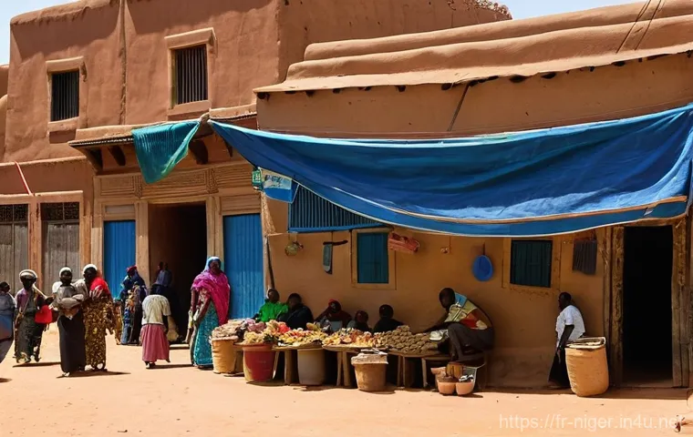 니제르에서 주택 가격 및 부동산 시장 - **A Vibrant Market in Agadez:** A bustling, sunlit market square in Agadez, Niger. The scene is fill...