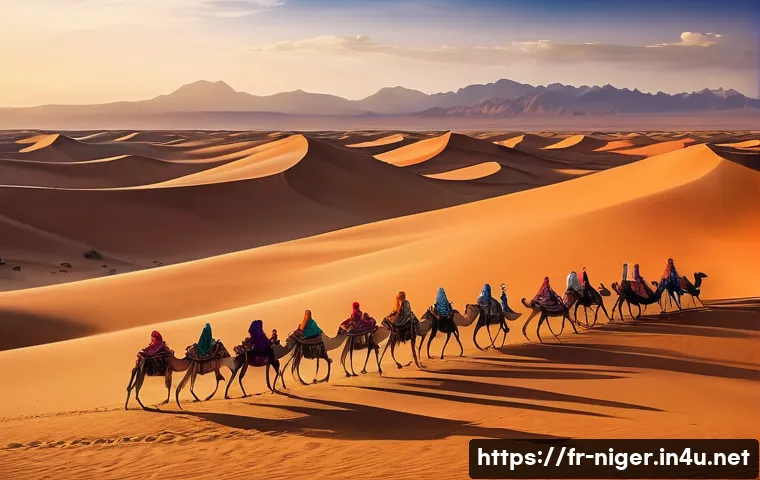 니제르에서 가장 유명한 관광 명소 - A panoramic view of the A&iuml;r Mountains desert landscape at sunset, featuring vast golden sand dunes, ...