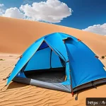 Home 23 니제르 사막 캠핑 팁 - A durable desert camping scene featuring a sturdy, wind-resistant tent pitched behind a sand dune un...